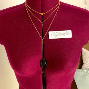 3 tiered gold coloured necklace